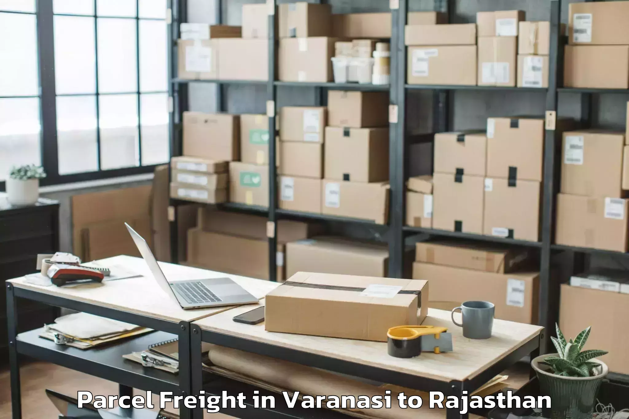 Book Varanasi to Siwana Parcel Freight Online